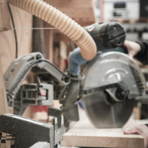 Pedante digital miter saw stop used for precise timber cutting at a dormer manufacturer in the Netherlands