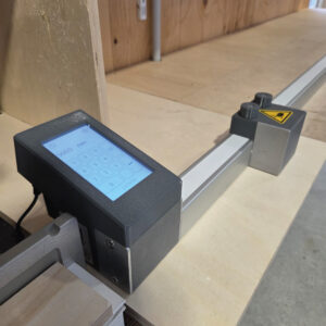 Pedante digital miter saw stop used for precise cutting in PVC window workshop in Latvia