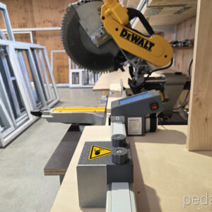 Pedante automatic length stop system integrated into miter saw station in PVC window manufacturing in Latvia
