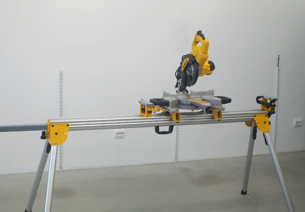 Miter saw mounted on portable stand for Pedante Digital Length Stop installation setup.