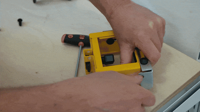 DeWALT DE7024 work support bracket height adjustment being moved from the outside to the inside of the bracket.