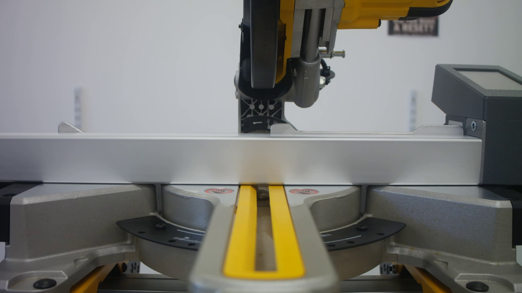 Pedante Digital Miter Saw Fence flushly placed on a miter saw table, with no visible gap.