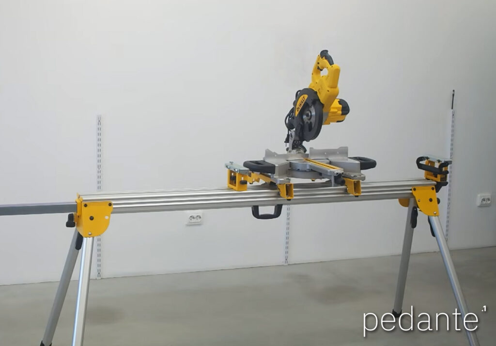DeWALT miter saw mounted on its portable stand before installing the Pedante digital miter saw fence