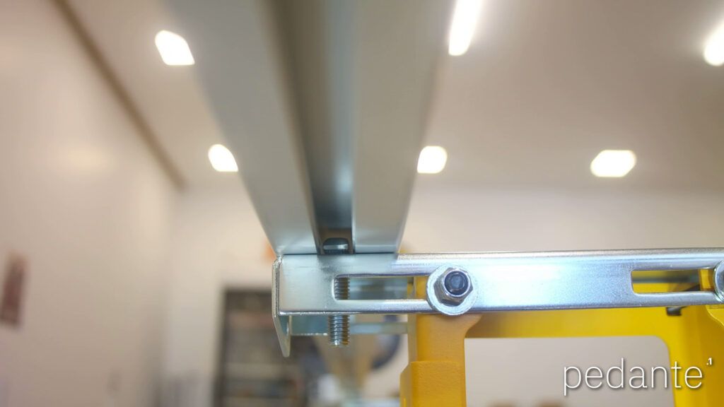 T-head bolt before its 90-degree turn to lock inside the Pedante rail’s underside groove